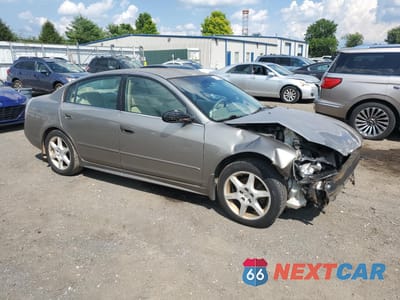 Czwarte zdjęcie samochodu z boku: 2002 NISSAN ALTIMA SE VIN:1N4BL11EX2C715570 - miniatura