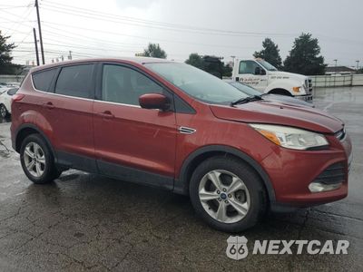 Czwarte zdjęcie samochodu z boku: 2014 FORD ESCAPE SE VIN:1FMCU9GX0EUC66316 - miniatura