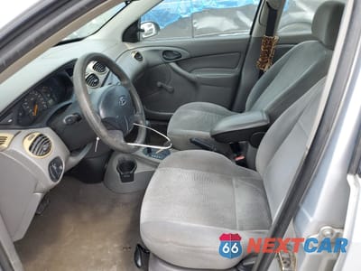Zdjęcie 7 z 14 samochodu: 2002 FORD FOCUS LX VIN:1FAFP33P72W253645 - miniatura