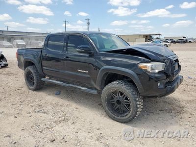 Czwarte zdjęcie samochodu z boku: 2017 TOYOTA TACOMA DOUBLE CAB VIN:5TFCZ5AN1HX071365 - miniatura