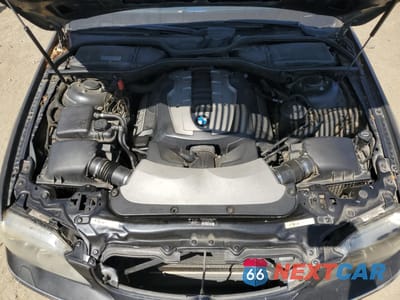 Zdjęcie 21 z 24 samochodu: 2006 BMW 750 LI VIN:WBAHN83576DT60262 - miniatura