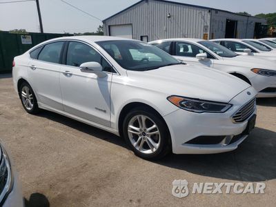 Czwarte zdjęcie samochodu z boku: 2018 FORD FUSION SE HYBRID VIN:3FA6P0LU6JR172061 - miniatura