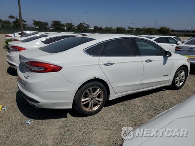 Trzecie zdjęcie samochodu z tyłu: 2018 FORD FUSION SE HYBRID VIN:3FA6P0LUXJR281865 - miniatura