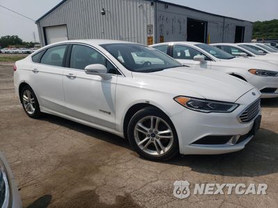 Czwarte zdjęcie samochodu z boku: 2018 FORD FUSION SE HYBRID VIN:3FA6P0LU0JR129867 - miniatura