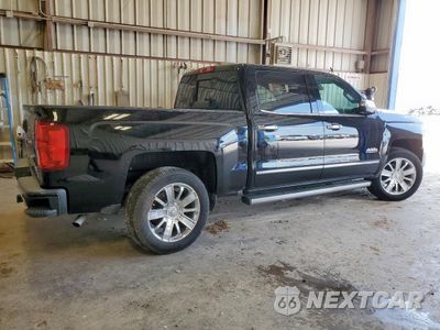 Trzecie zdjęcie samochodu z tyłu: 2017 CHEVROLET SILVERADO C1500 HIGH COUNTRY VIN:3GCPCTEC1HG339819 - miniatura