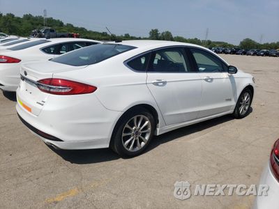 Trzecie zdjęcie samochodu z tyłu: 2017 FORD FUSION SE HYBRID VIN:3FA6P0LU6HR409674 - miniatura