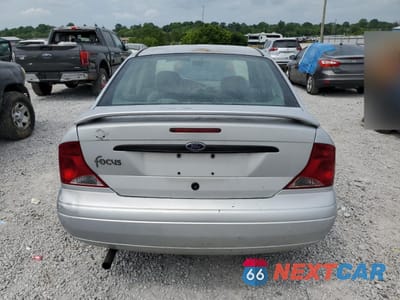 Zdjęcie 6 z 14 samochodu: 2002 FORD FOCUS LX VIN:1FAFP33P72W253645 - miniatura
