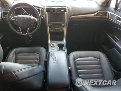 Zdjęcie 8 z 12 samochodu: 2017 FORD FUSION SE HYBRID VIN:3FA6P0LU0HR409170 - miniatura