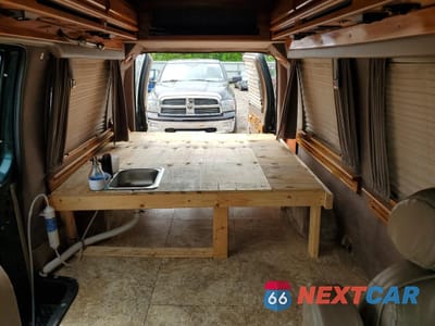 Zdjęcie 10 z 13 samochodu: 1994 FORD ECONOLINE E150 VAN VIN:1FDEE14H1RHB89667 - miniatura