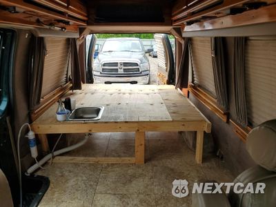 Zdjęcie 10 z 13 samochodu: 1994 FORD ECONOLINE E150 VAN VIN:1FDEE14H1RHB89667 - miniatura