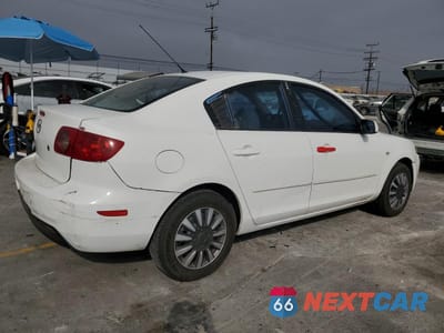 Trzecie zdjęcie samochodu z tyłu: 2004 MAZDA 3 I VIN:JM1BK12F141165338 - miniatura