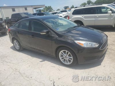Czwarte zdjęcie samochodu z boku: 2018 FORD FOCUS SE VIN:1FADP3FE3JL210938 - miniatura