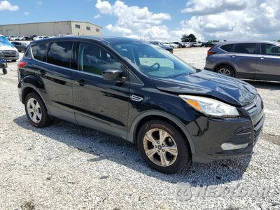 Czwarte zdjęcie samochodu z boku: 2016 FORD ESCAPE SE VIN:1FMCU0G79GUC70833 - miniatura