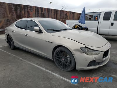 Czwarte zdjęcie samochodu z boku: 2014 MASERATI GHIBLI S VIN:ZAM57RTA8E1095303 - miniatura