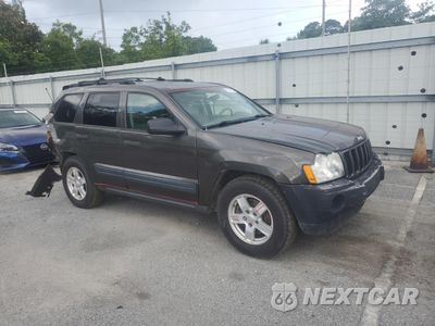 Czwarte zdjęcie samochodu z boku: 2006 JEEP GRAND CHEROKEE LAREDO VIN:1J4GR48K36C220607 - miniatura
