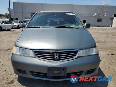 Piąte zdjęcie samochodu w środku: 2001 HONDA ODYSSEY EX VIN:2HKRL18651H569136 - miniatura