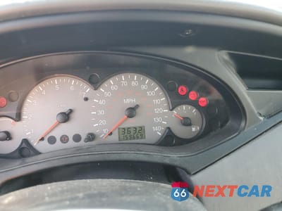 Zdjęcie 9 z 12 samochodu: 2003 FORD FOCUS ZX5 VIN:3FAFP37333R146054 - miniatura