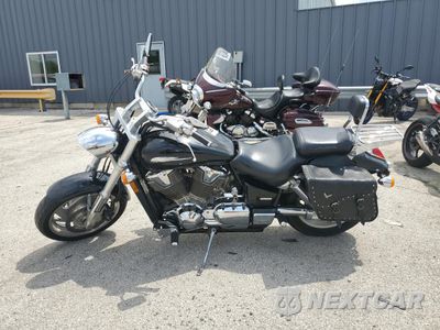 Trzecie zdjęcie samochodu z tyłu: 2003 HONDA VTX1800 C VIN:1HFSC460X3A104515 - miniatura