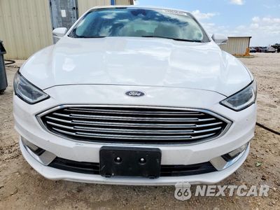 Piąte zdjęcie samochodu w środku: 2017 FORD FUSION SE HYBRID VIN:3FA6P0LU2HR408991 - miniatura