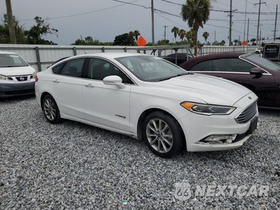 Czwarte zdjęcie samochodu z boku: 2017 FORD FUSION SE HYBRID VIN:3FA6P0LU6HR409643 - miniatura