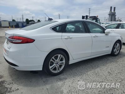 Trzecie zdjęcie samochodu z tyłu: 2018 FORD FUSION SE HYBRID VIN:3FA6P0LU5JR278727 - miniatura