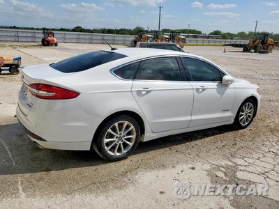 Trzecie zdjęcie samochodu z tyłu: 2017 FORD FUSION SE HYBRID VIN:3FA6P0LU6HR409030 - miniatura