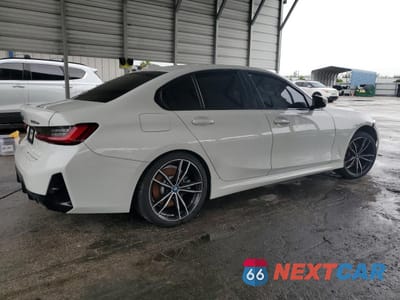 Trzecie zdjęcie samochodu z tyłu: 2023 BMW 330E VIN:3MW39FF05P8D00837 - miniatura