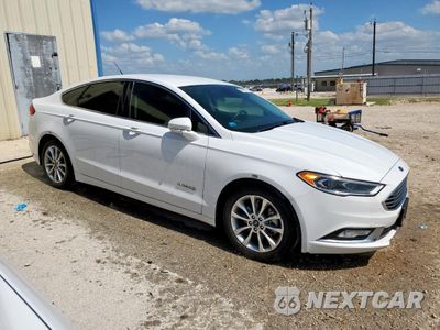 Czwarte zdjęcie samochodu z boku: 2017 FORD FUSION SE HYBRID VIN:3FA6P0LU8HR408994 - miniatura