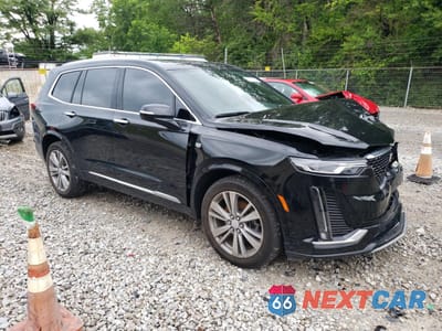 Czwarte zdjęcie samochodu z boku: 2023 CADILLAC XT6 PREMIUM LUXURY VIN:1GYKPDRS5PZ189339 - miniatura