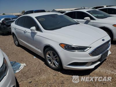 Czwarte zdjęcie samochodu z boku: 2018 FORD FUSION SE HYBRID VIN:3FA6P0LU3JR171577 - miniatura