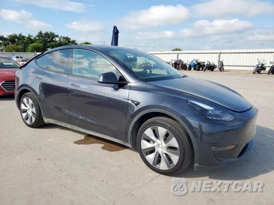 Czwarte zdjęcie samochodu z boku: 2024 TESLA MODEL Y VIN:7SAYGAEE7RF082917 - miniatura