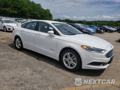 Czwarte zdjęcie samochodu z boku: 2018 FORD FUSION SE HYBRID VIN:3FA6P0LUXJR281915 - miniatura