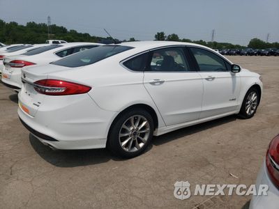 Trzecie zdjęcie samochodu z tyłu: 2017 FORD FUSION SE HYBRID VIN:3FA6P0LU0HR409086 - miniatura