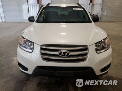 Piąte zdjęcie samochodu w środku: 2012 HYUNDAI SANTA FE GLS VIN:5XYZG3AB4CG103215 - miniatura