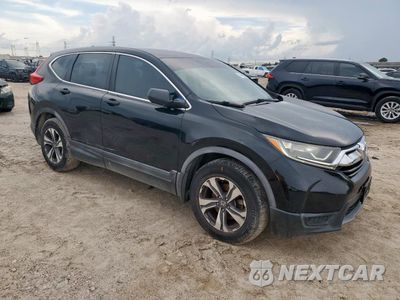 Czwarte zdjęcie samochodu z boku: 2017 HONDA CR-V LX VIN:7FARW5H30HE013382 - miniatura