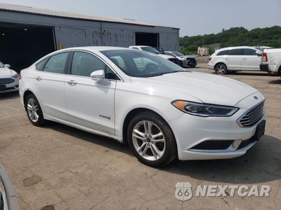 Czwarte zdjęcie samochodu z boku: 2018 FORD FUSION SE HYBRID VIN:3FA6P0LU0JR118710 - miniatura