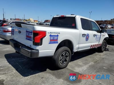 Trzecie zdjęcie samochodu z tyłu: 2023 FORD F150 LIGHTNING PRO VIN:1FTVW1EL4PWG02954 - miniatura