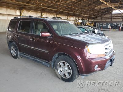 Czwarte zdjęcie samochodu z boku: 2011 HONDA PILOT TOURING VIN:5FNYF3H97BB013158 - miniatura