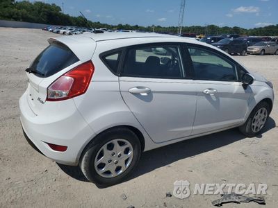Trzecie zdjęcie samochodu z tyłu: 2014 FORD FIESTA S VIN:3FADP4TJ6EM124857 - miniatura