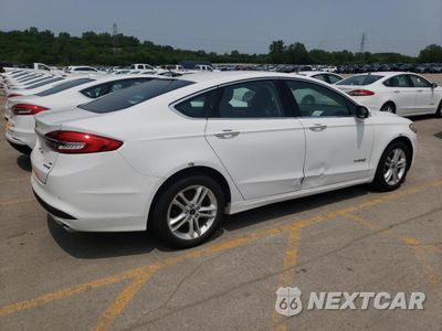 Trzecie zdjęcie samochodu z tyłu: 2018 FORD FUSION SE HYBRID VIN:3FA6P0LU1JR172081 - miniatura