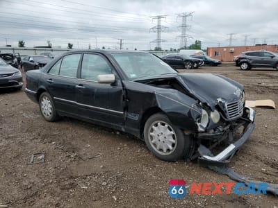 Czwarte zdjęcie samochodu z boku: 1997 MERCEDES-BENZ E 300D VIN:WDBJF20F6VA355273 - miniatura