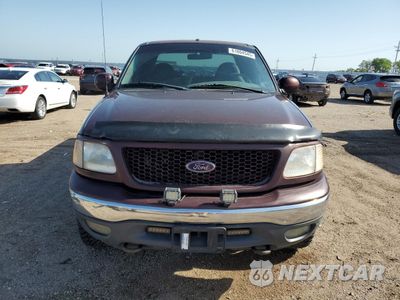 Piąte zdjęcie samochodu w środku: 2000 FORD F150 VIN:1FTRX18L6YNA02664 - miniatura
