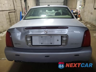 Zdjęcie 6 z 12 samochodu: 2004 CADILLAC DEVILLE VIN:1G6KD54Y84U236455 - miniatura