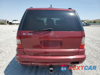 Zdjęcie 6 z 15 samochodu: 2002 MERCEDES-BENZ ML 320 VIN:4JGAB54E42A297266 - miniatura