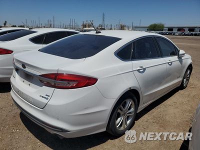 Trzecie zdjęcie samochodu z tyłu: 2018 FORD FUSION SE HYBRID VIN:3FA6P0LU8JR171607 - miniatura