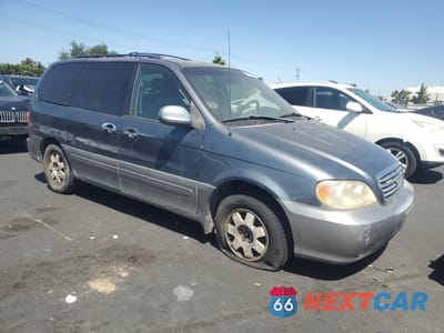 Czwarte zdjęcie samochodu z boku: 2002 KIA SEDONA EX VIN:KNDUP131526310930 - miniatura
