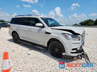 Czwarte zdjęcie samochodu z boku: 2021 LINCOLN NAVIGATOR RESERVE VIN:5LMJJ2LT0MEL03302 - miniatura