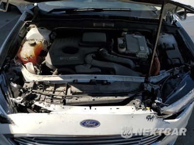 Zdjęcie 11 z 12 samochodu: 2017 FORD FUSION SE HYBRID VIN:3FA6P0LU8HR381067 - miniatura