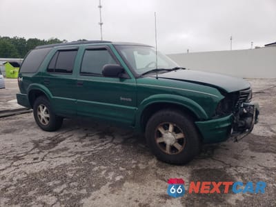 Czwarte zdjęcie samochodu z boku: 2000 OLDSMOBILE BRAVADA VIN:1GHDT13W6Y2373830 - miniatura