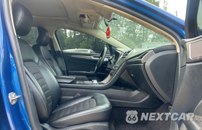 Piąte zdjęcie samochodu w środku: 2017 FORD FUSION SE VIN:3FA6P0HD7HR183895 - miniatura